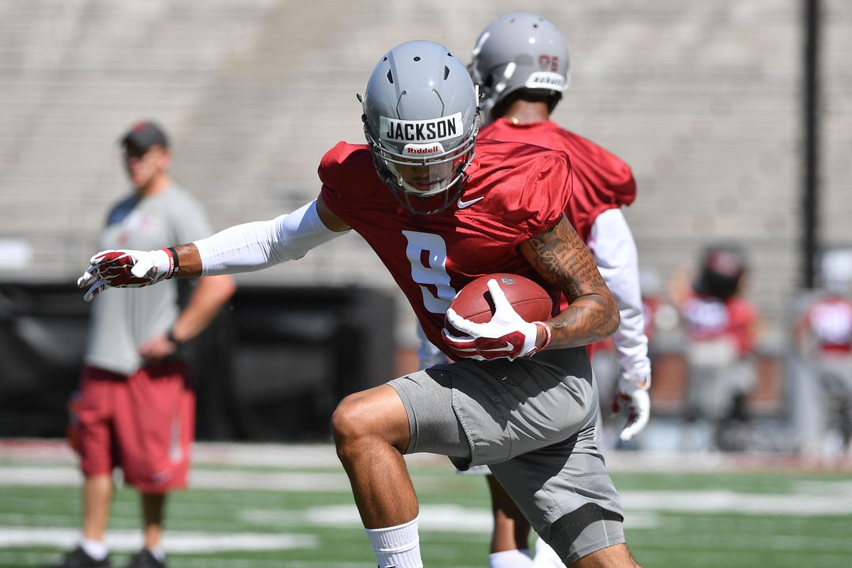 Washington State’s Drue Jackson  catches the ball during practice on Friday  at Martin Stadium in Pullman. (Tyler Tjomsland / The Spokesman-Review)