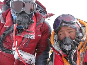 On the summit: climbing guide Chewang Sherpa, right, and sirdar Lakpa Rita Sherpa helped Kay LeClaire of Spokane scale Mount Everest. (The Spokesman-Review)