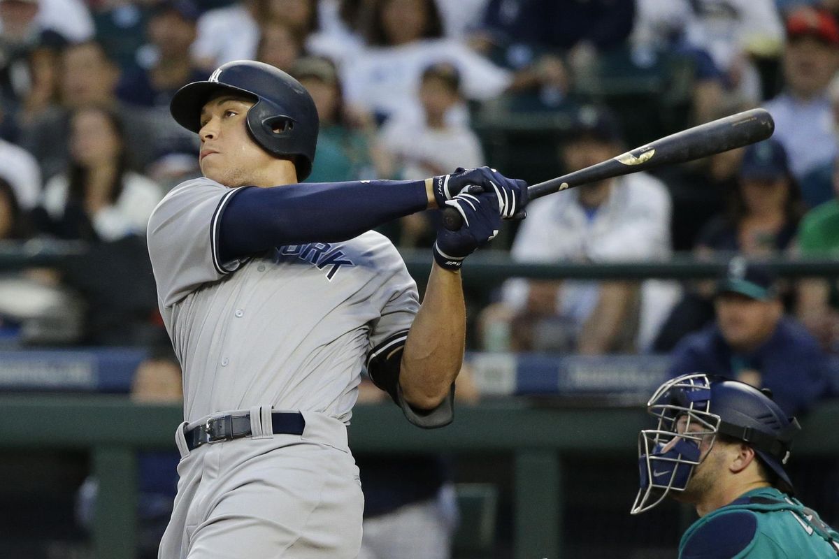New York Yankees’ Aaron Judge watches his three-run home run against the Seattle Mariner during the fifth inning of a baseball game Friday, July 21, 2017, in Seattle. (Ted S. Warren / Associated Press)