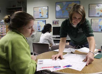 
Katie Parker advises Sophia Prantera, 18, on study abroad programs at Michigan State University's Office of Study Abroad Resource Center in East Lansing, Mich. Associated Press photos
 (Associated Press photos / The Spokesman-Review)