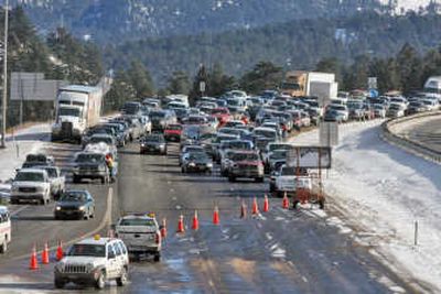 
Westbound traffic backs up Monday west of Denver on Interstate 70, a stretch of which was closed because of avalanche danger. Associated Press
 (Associated Press / The Spokesman-Review)