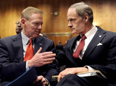 Senate Banking Committee member Sen. Tom Carper D-Del., right, talks with Ford Chief Executive Officer Alan Mulally on Capitol Hill in Washington, D. C., on Thursday.  (Associated Press / The Spokesman-Review)