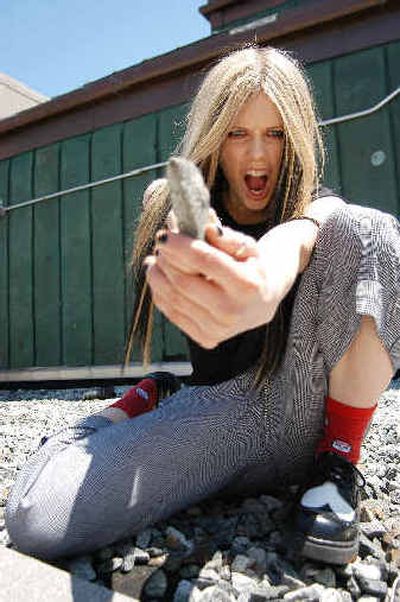 
Singer Avril Lavigne poses on a rooftop in Union Square in New York.Singer Avril Lavigne poses on a rooftop in Union Square in New York.
 (Associated PressAssociated Press / The Spokesman-Review)