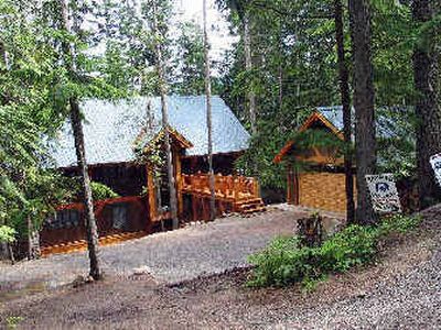 
Like this newly built cabin on the western shore of Priest Lake, the construction of upscale cabins on National Forest permit sites has prompted restrictions to preserve the rustic charm of the area. 
 (James Hagengruber / The Spokesman-Review)