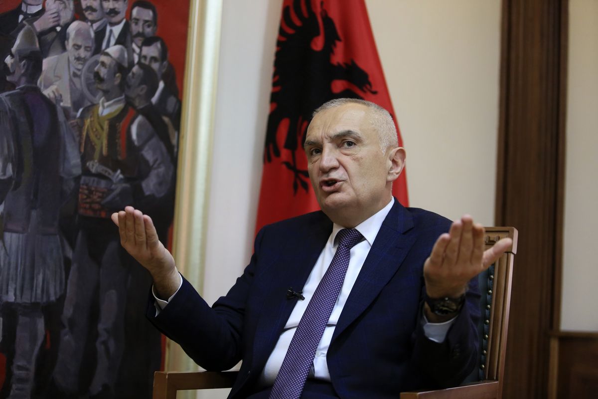 In this Wednesday, April 21, 2021 photo, Albanian President Ilir Meta speaks during an interview with the Associated Press in Tirana, Albania. Albania’s president has accused the U.S. ambassador of intervening in the small European country’s internal affairs by supporting its prime minister in an upcoming parliamentary election. Meta spoke harshly about Ambassador Yuri Kim during a television talk show on Friday, April 23, 2021. While the show was airing, Kim sent a text message to Meta and also tweeted about Sunday’s election.  (Hektor Pustina)