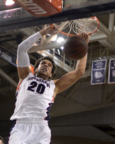 Gonzaga forward Elias Harris (20) slam dunks the ball against San Diego during the first half of their men's basketball game on Saturday, Feb. 23, 2013, in the McCarthey Athletic Center.