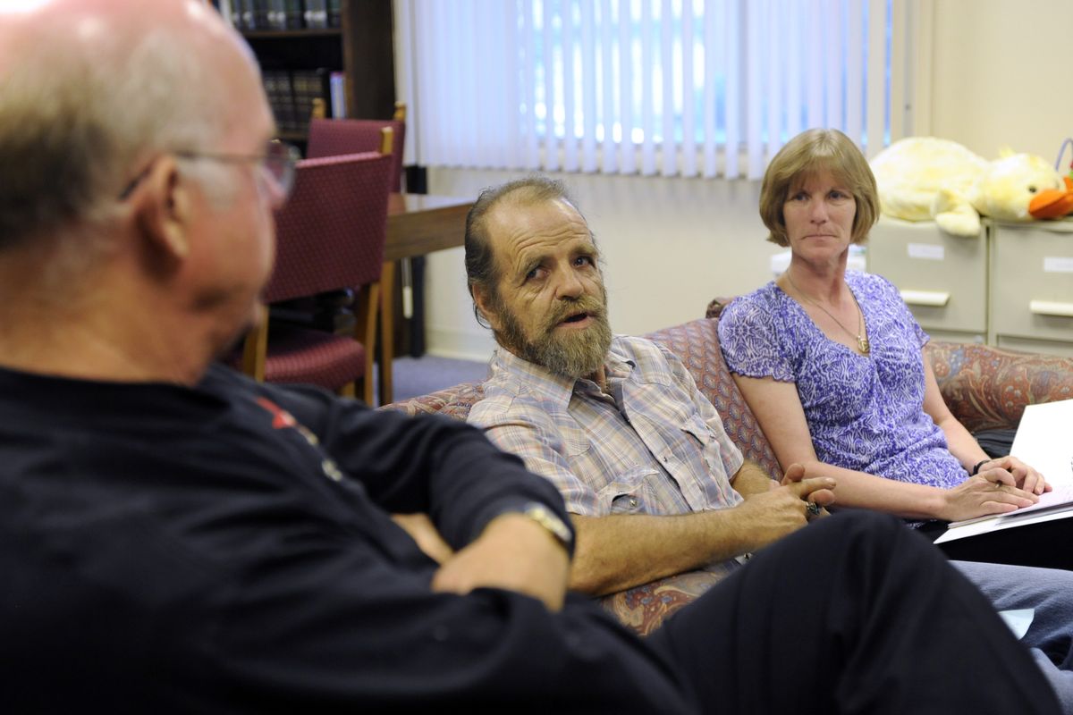 Angie and Bobby Olson of Coeur d’Alene have been married for six years and embarked together on the Circles process to work themselves out of poverty through networking with middle-class community members, including Dale Lloyd of Post Falls. (Jesse Tinsley / The Spokesman-Review)