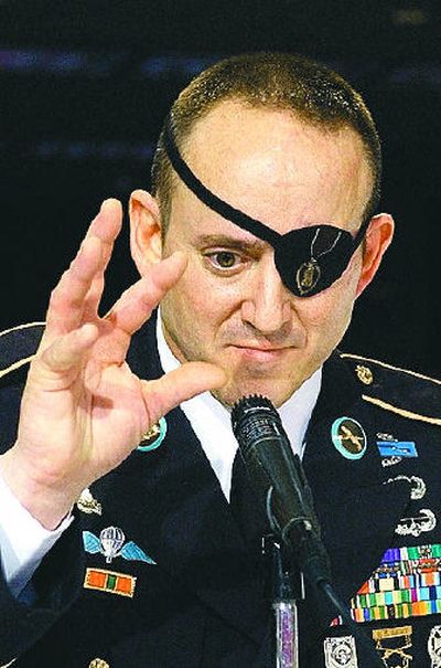 
Staff Sgt. John Daniel Shannon, who was hit injured by a roadside bomb, testifies Monday before a House Oversight and Government Reform subcommittee. He was housed in Building 18 after returning from Iraq.
 (Associated Press / The Spokesman-Review)