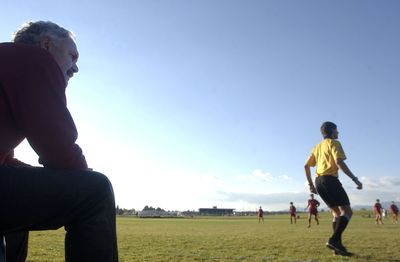 Coach Randy Thoreson of the Sandpoint Bulldog boys soccer team, watches the action from the sidelines in this 2005 photo.  (File / The Spokesman-Review)