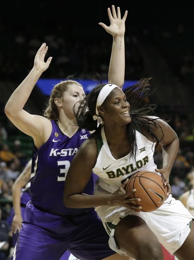 Baylor's Kalani Brown, right, turns against Kansas State’s Ashley Ray during Saturday’s game. (Tony Gutierrez / Associated Press)