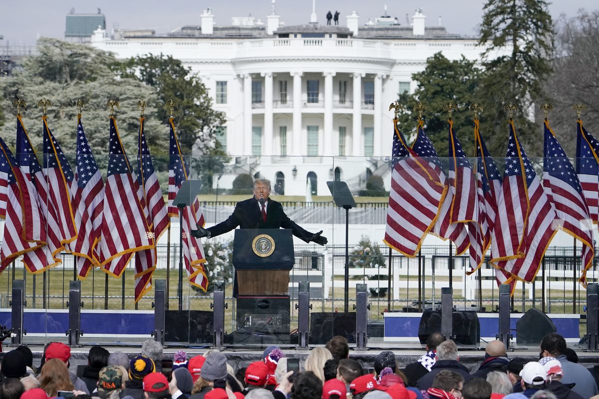 FILE - In this Jan. 6, 2021, file photo with the White House in the background, President Donald Trump speaks at a rally in Washington. The request seeks records about events leading up to the Jan. 6 attack, including communication within the White House and other agencies, and information about planning and funding for rallies held in Washington, including an event at the Ellipse featuring then-President Donald Trump before thousands of his supporters stormed the Capitol.  (Jacquelyn Martin)