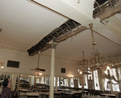 
Michael Guste, general manager of Antoine's Restaurant in New Orleans' French Quarter, looks up at the water-damaged ceiling in this Nov. 11 photo. 
 (File/Associated Press / The Spokesman-Review)