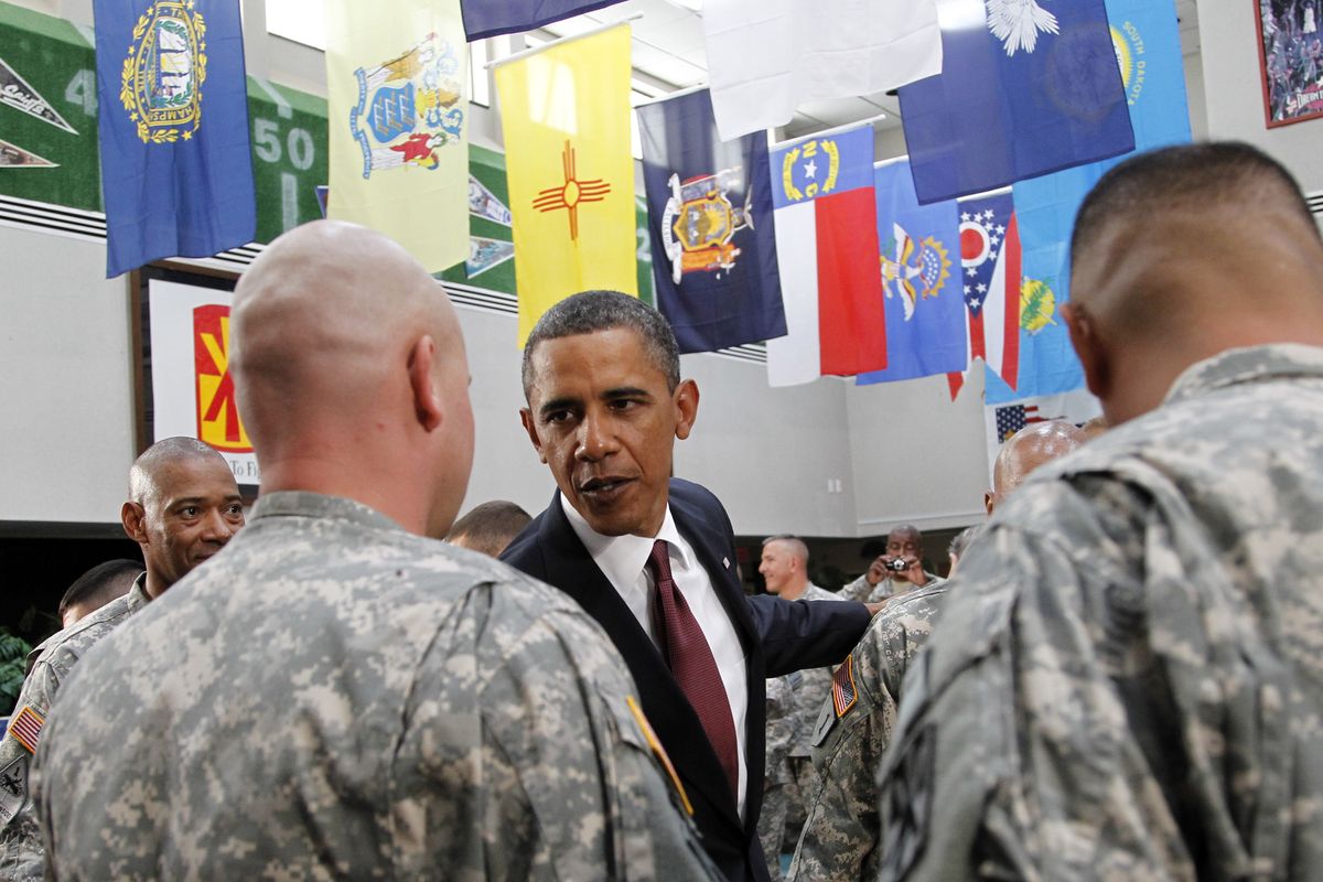 President Barack Obama greets members of the military at Fort Bliss in El Paso, Texas, on Tuesday, Aug. 31, 2010. (Pablo Monsivais / Associated Press)
