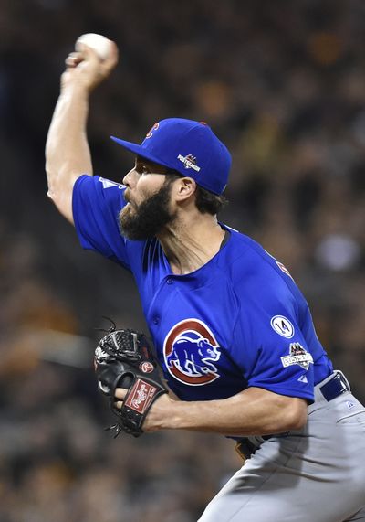 Cubs starter Jake Arrieta fired a complete-game, four-hit shutout at the Pirates on Wednesday. (Don Wright / Associated Press)