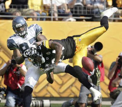 The Steelers stymied the Seahawks all game long; here, Ike Taylor going airborne to break up a pass intended for Ben Obomanu. Associated Press
(Associated Press / The Spokesman-Review)