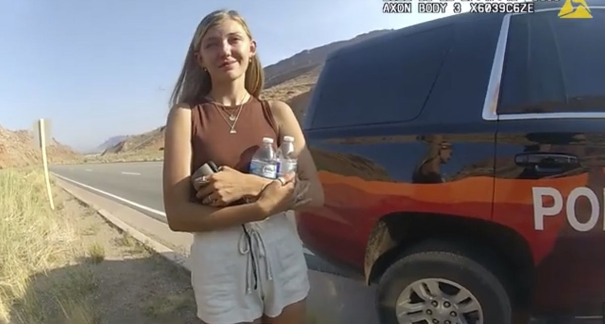 FILE - This police camera video provided by The Moab Police Department shows Gabrielle "Gabby" Petito talking to a police officer after police pulled over the van she was traveling in with her boyfriend, Brian Laundrie, near the entrance to Arches National Park on Aug. 12, 2021. Teton County Coroner Brent Blue is scheduled to announce the findings of Petito's autopsy at a news conference early Tuesday, Oct. 12.  (HOGP)