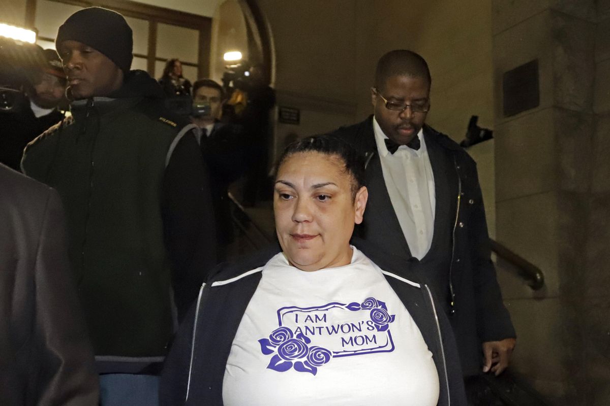 Michelle Kenney, center, the mother of Antwon Rose II, leaves the Allegheny County Courthouse with supporters after hearing the verdict of not guilty on all charges for Michael Rosfeld, a former police officer in East Pittsburgh, Pa., Friday, March 22, 2019. Rosfeld was charged with homicide in the fatal shooting of Antwon Rose II as he fled during a traffic stop on June 19, 2018. (Gene J. Puskar / Associated Press)