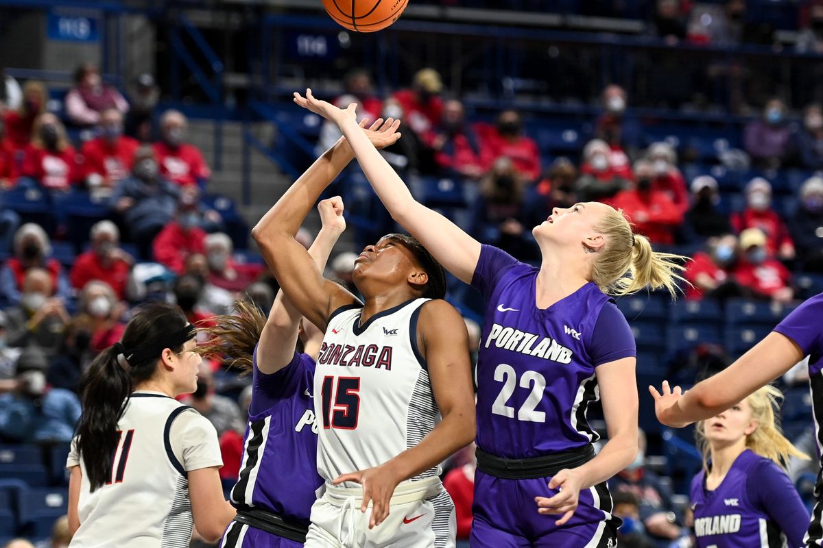 Gonzaga Bulldogs forward Yvonne Ejim (15) battles Portland Pilots guard MJ Bruno (22) in the paint during the second half of a college basketball game on Thursday, Jan 20, 2022, at McCarthey Athletic Center in Spokane, Wash. Gonzaga won the game 68-59.  (Tyler Tjomsland/The Spokesman-Review)