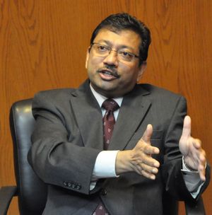 Arun Raha, Washington state's chief economist, explains his forecast for the current and coming biennia at the meeting of the Economic and Revenue Forecast Council on June 17. (Jim Camden/Spokesman-Review)