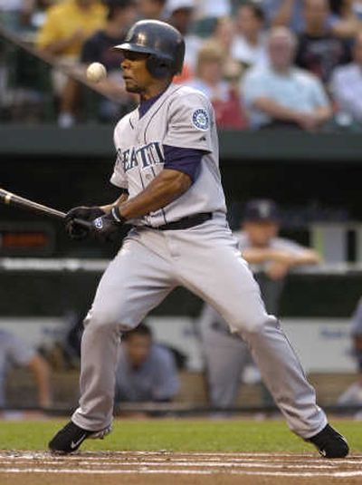 
Seattle's Jose Guillen reacts after being hit by a pitch from Baltimore's Daniel Cabrera.Associated Press
 (Associated Press / The Spokesman-Review)