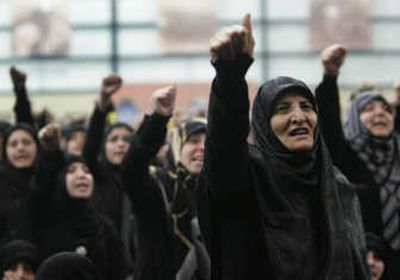 
Shiite women and Hezbollah supporters shout slogans at the funeral procession for  Imad Mughniyeh.Associated Press
 (Associated Press / The Spokesman-Review)