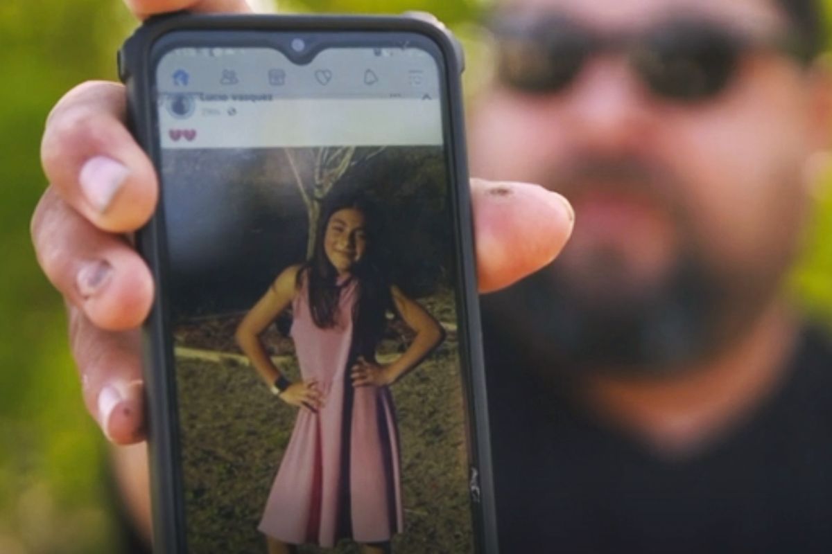 In this image from video, Javier Cazares shows a picture of his daughter, Jackie Cazares, Thursday, May 26, 2022, in Uvalde, Texas. Jackie, 9, was among the 19 children and two teachers killed during a mass shooting at Robb Elementary School on Tuesday. (Robert Bumsted)