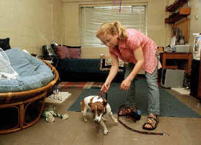 
Alexandra Geisler unleashes her dog Abbey Road on Aug. 24 in her dorm room at Prunty Hall on the campus of Stephens College in Columbia, Mo. The dog is part of a pilot program allowing pets to live in the residence hall. 
 (Associated Press / The Spokesman-Review)