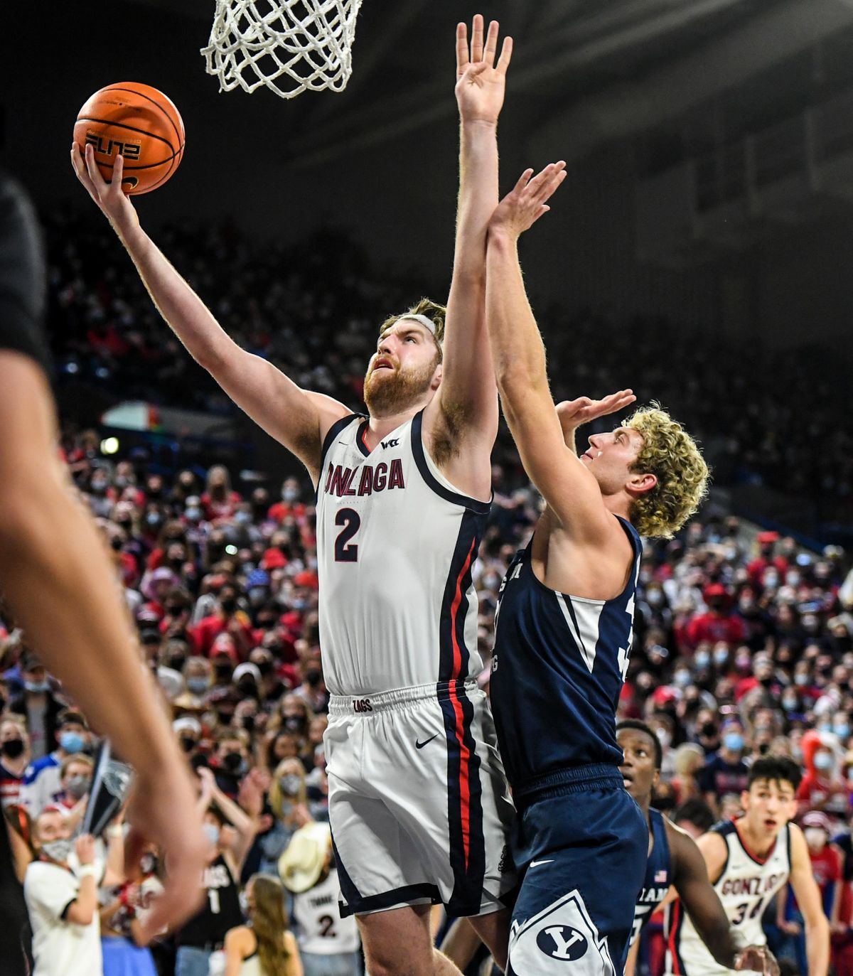 Gonzaga forward Drew Timme, who scored 30 points, works his way past BYU forward Caleb Lohner during Thursday’s game.  (Dan Pelle/THE SPOKESMAN-REVIEW)