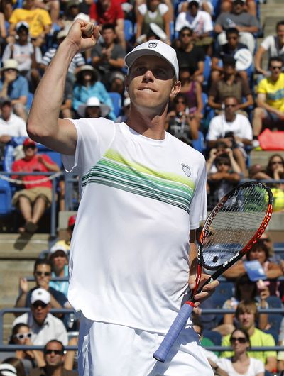 Sam Querrey of the United States celebrates after winning his match against Nicolas Almagro of Spain at the U.S. Open. (Associated Press)