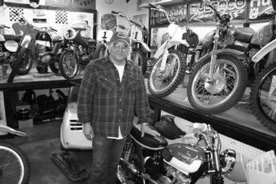 
Jim Allen Sr. stands among his collection of vintage motorcycles at Allen's Cycle. The  shop on North Pittsburg Street  doubles as a museum. 
 (Paul Delaney / The Spokesman-Review)