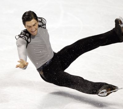 Evan Lysacek falls while competing during the men's free skate at the U.S. Figure Skating Championships in Spokane, Wash., Sunday, Jan. 17, 2010. Lysacek finished second in the competition. (Rick Bowmer / Associated Press)