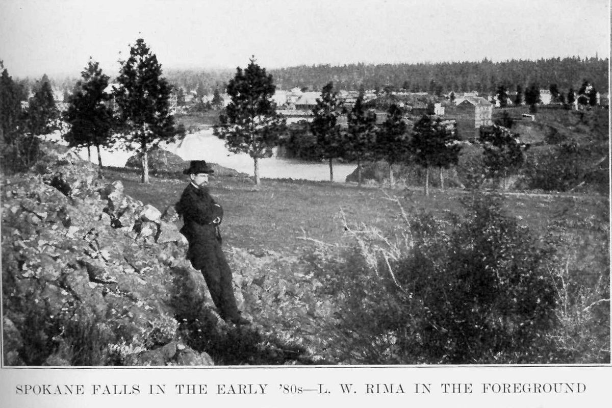 L.W. Rima photographed by the Spokane River. Early Spokane researchers have concluded Rima was on the north side of the river, looking west, standing approximately at what is now the intersection of Broadway and Monroe. They place the time between 1880-1883 based on what is and isn’t seen in the photo, such as the absence of the Post Street Bridge (built in 1883) and the presence in the background of the three-story flour mill built by Frederick Post in 1876, among other indicators. 