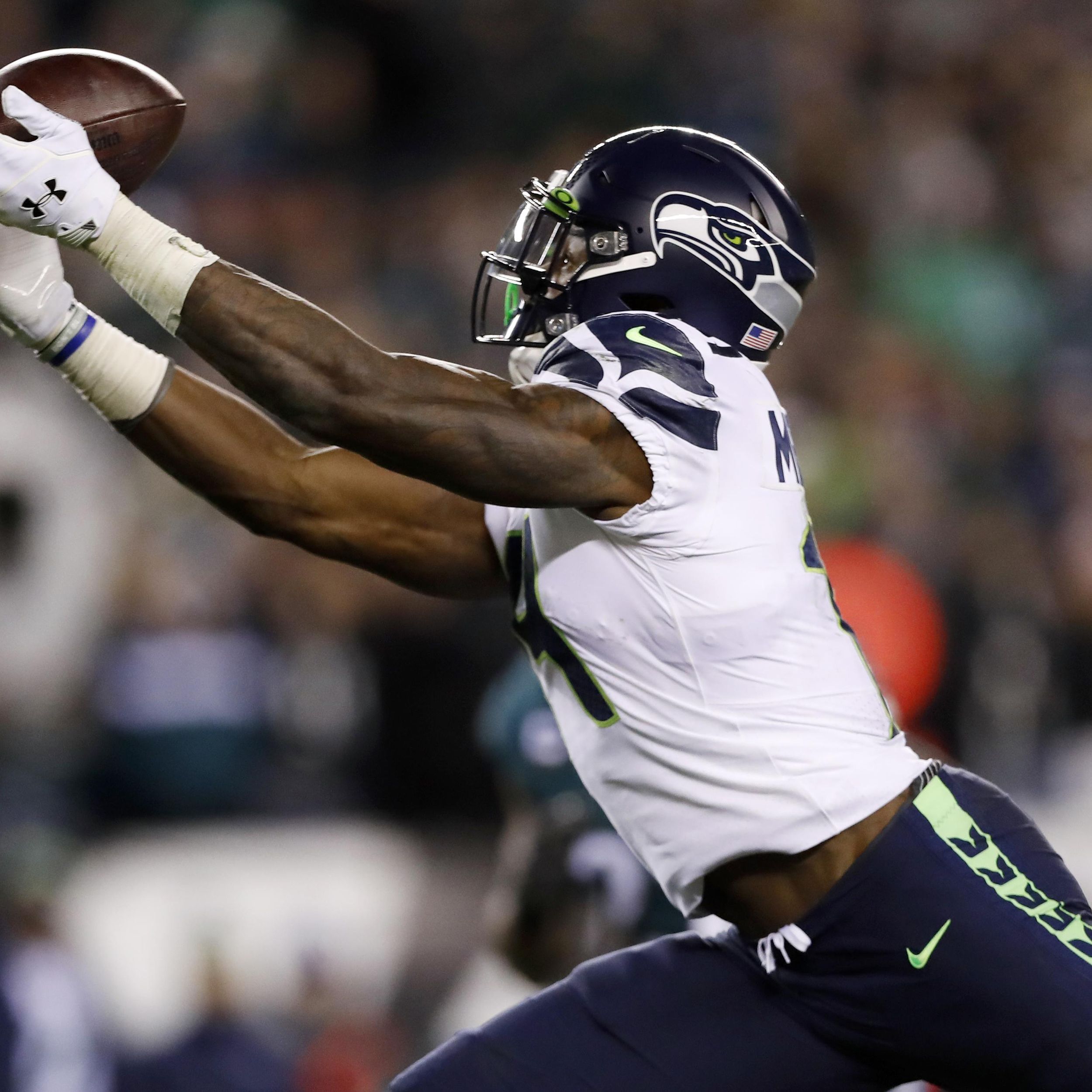 Seattle Seahawks' D.K. Metcalf catches a touchdown pass during the second  half of an NFL wild-card playoff football game against the Philadelphia  Eagles, Sunday, Jan. 5, 2020, in Philadelphia. (AP Photo/Julio Cortez