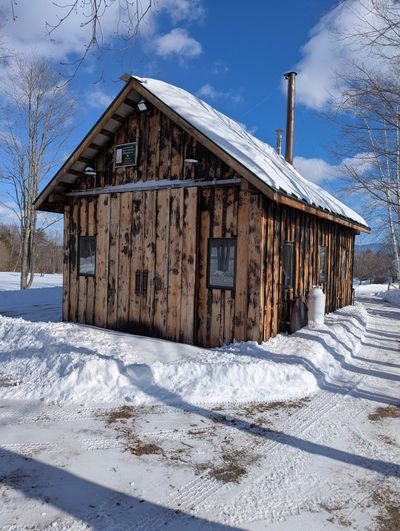 The black blotches visible on this building are not mold and mildew. The owner used a large propane-fueled blowtorch to char the siding. Charred wood resists insects, rot and UV light.  (Tribune Content Agency)