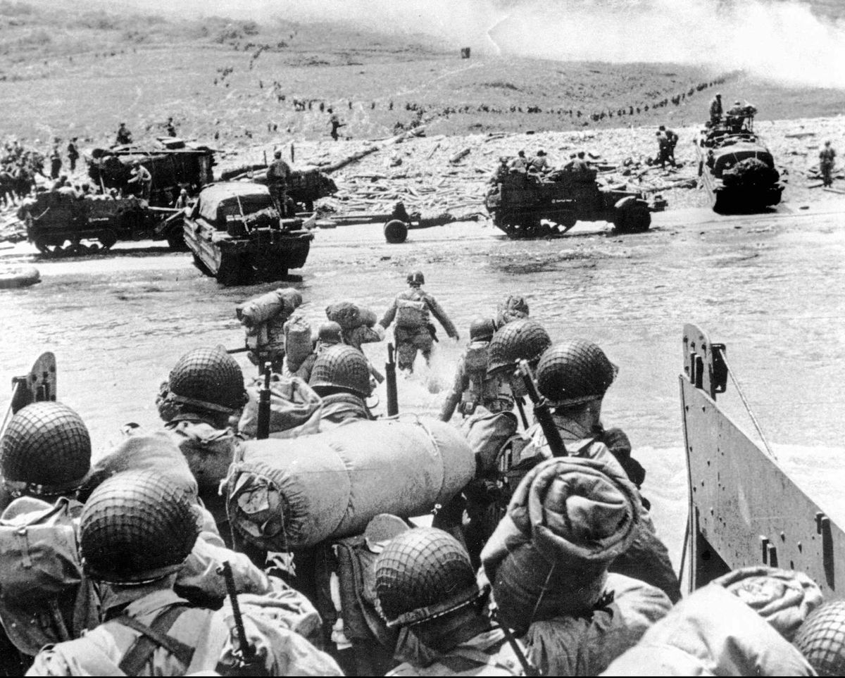 American soldiers land on the French coast of Normandy during the D-Day invasion in June 1944.  (Associated Press)