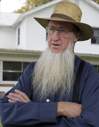 Sam Mullet Sr. stands in the front yard of his home in Bergholz, Ohio, in October 2011. (Associated Press)
