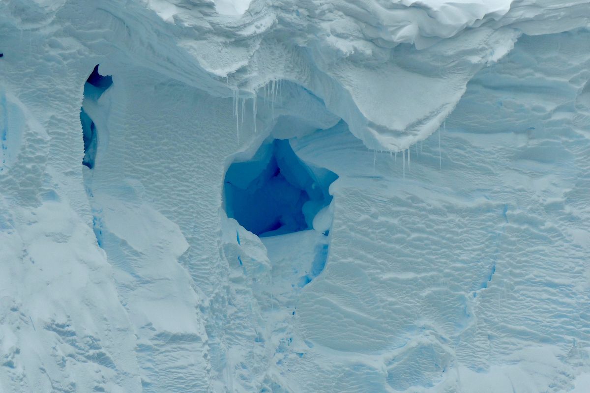 This 2019 photo provided by the British Antarctic Survey shows a hole in the Thwaites glacier in Antarctica. Starting Thursday, Jan. 6, 2021, a team of scientists are sailing to the massive but melting Thwaites glacier, “the place in the world that’s the hardest to get to,” so they can better figure out how much and how fast seas will rise because of global warming eating away at Antarctica’s ice.  (David Vaughan)