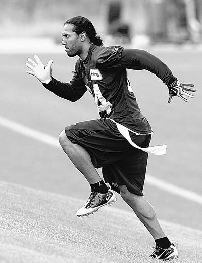 Seahawks’ receivers T.J. Houshmandzadeh, above, and Deion Branch are nearly recovered from offseason surgeries. (Associated Press)