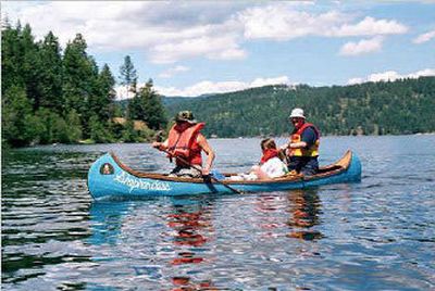 
Family camp at Camp Sweyolakan, located on Mica Bay in Coeur d'Alene, provides families with a variety of activities from canoeing and archery to crafts and more. Family camp provides a way for parents (or other relatives) and kids to bond.
 (Courtesy of Campfire Inland Northwest Council / The Spokesman-Review)