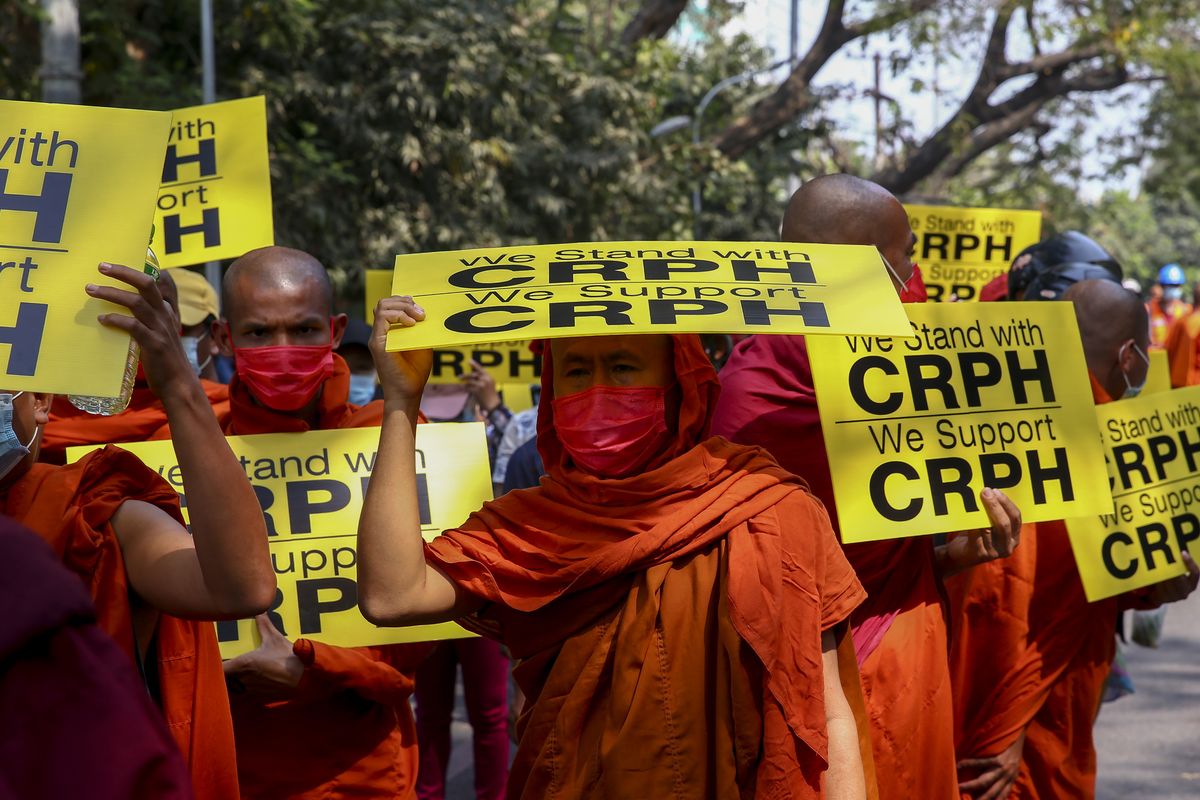 Buddhist monks lead an anti-coup protest march in Mandalay, Myanmar, Saturday, Feb. 27, 2021. Myanmar security forces cracked down on anti-coup protesters in the country