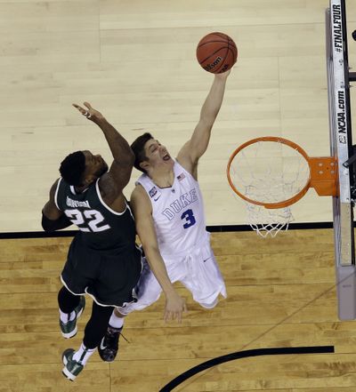 Men’s basketball had shot clock dropped from 35 seconds to 30. (Associated Press)