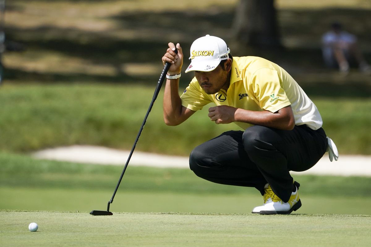 Hideki Matsuyama, of Japan, lines up his putt on the 11th green during the first round of the BMW Championship golf tournament, Thursday, Aug. 27, 2020, at Olympia Fields Country Club in Olympia Fields, Ill.  (Associated Press)