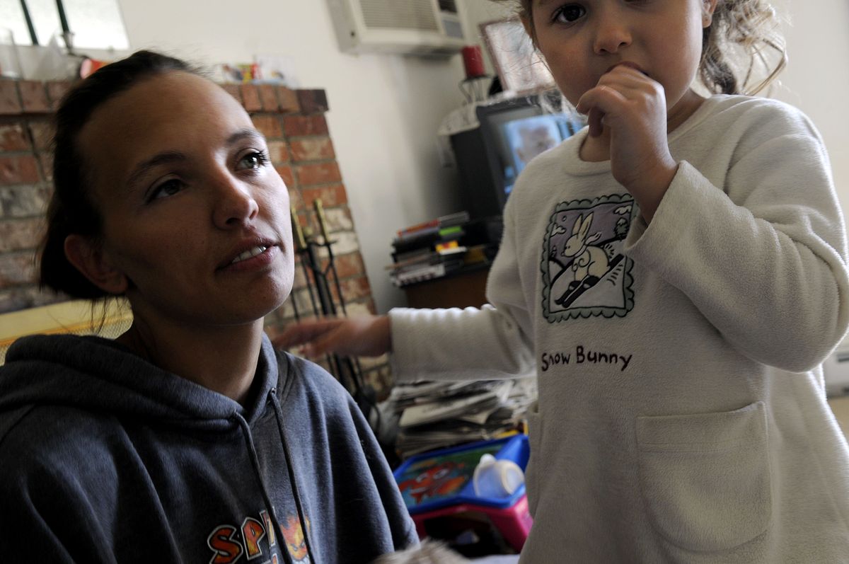 Amber Deahn sits with her daughter Maria, 4, at their Coeur d’Alene home Wednesday. Of Joseph Duncan’s sentence, she said: “This chapter is over, but God knows how many more families he’s hurt.” Deahn helped rescue Shasta Groene at a Denny’s in Coeur d’Alene in July 2005.  (Kathy Plonka / The Spokesman-Review)