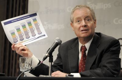 Jim Mulva,  CEO of ConocoPhillips, uses a chart to explain the high cost of gasoline during a press conference in Houston in May.  (Associated Press / The Spokesman-Review)