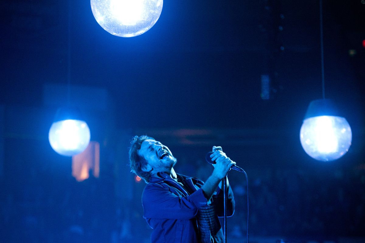 Lead singer Eddie Vedder belts out a song to a full house at the Pearl Jam concert Saturday at the Spokane Arena. The concert was Pearl Jam’s first in Spokane since 1993. See more photos at www.spokesman.com/picture-stories. (Jesse Tinsley)