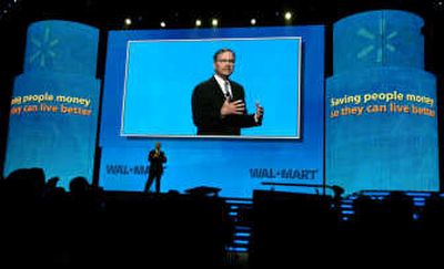 
Wal-Mart Stores Inc. President and CEO Lee Scott speaks Friday at  the annual  shareholder's meeting in Fayetteville, Ark.Associated Press
 (Associated Press / The Spokesman-Review)