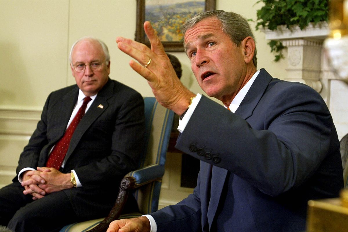 FILE - President George W. Bush, right, with Vice President Dick Cheney at his side, speaks during a meeting with congressional leaders in the White House Oval Office on Sept. 18, 2002. A new CNN Films documentary explores the role of the U.S. vice presidency, which in modern times has emerged into a more powerful position. Still, the film notes that a veep’s duties are all up to the president.  (Doug Mills)