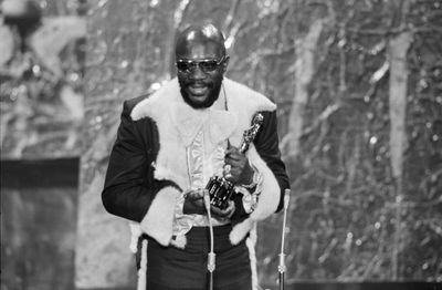 Isaac Hayes holds his best song Oscar for “Theme From Shaft” from the movie “Shaft” during the Academy Awards ceremony in 1972.  (File Associated Press / The Spokesman-Review)