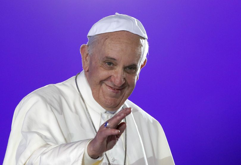 Pope Francis greets pilgrims from the stage of the World Youth Day Welcome Feast on the Copacabana beachfront in Rio de Janeiro, Brazil, Thursday, July 25, 2013. Francis addressed young pilgrims from 175 nations gathered on the famous beach for the WYD festival. (Stefano Rellandini / Reuters)