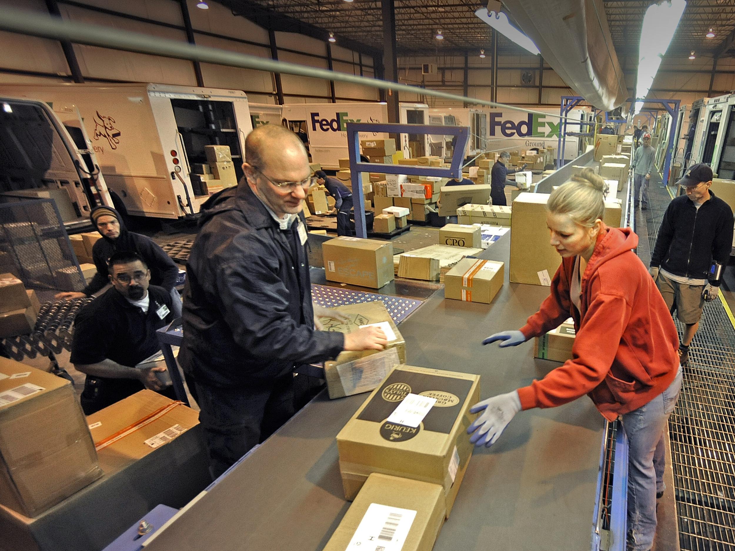 Flood of holiday shipments fills growing FedEx facility | The  Spokesman-Review